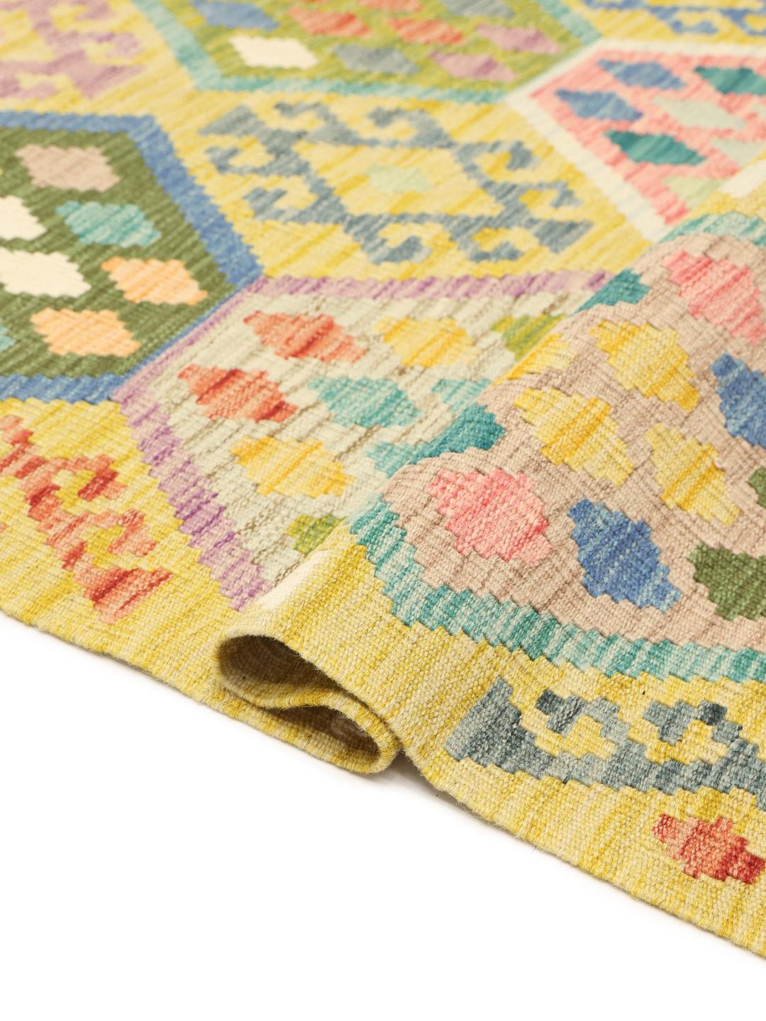 Hand-woven Afghan Kelim rug with geometric patterns in multicolor wool