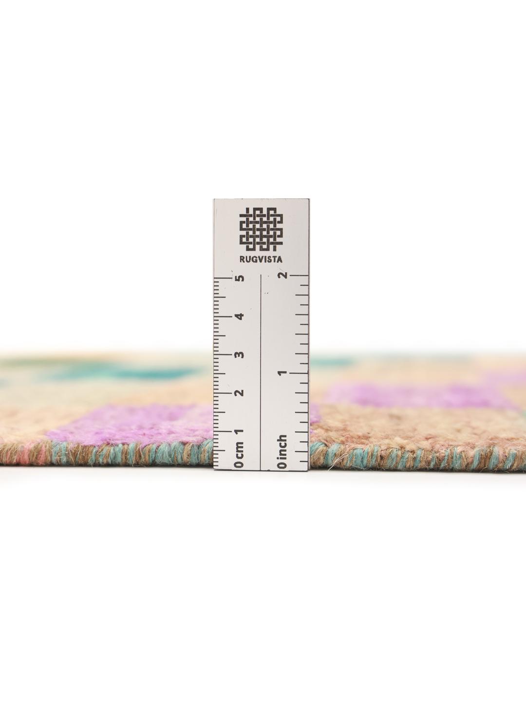 A vibrant multicoloured hand-knotted runner from Afghanistan with a geometric block pattern.