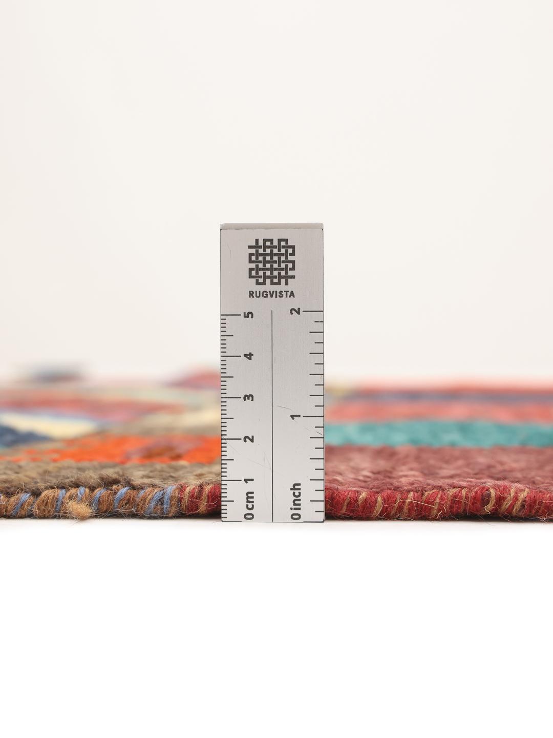 Handgeknoopt Berber-tapijt uit Afghanistan met levendige geometrische patronen in veelkleurige wol