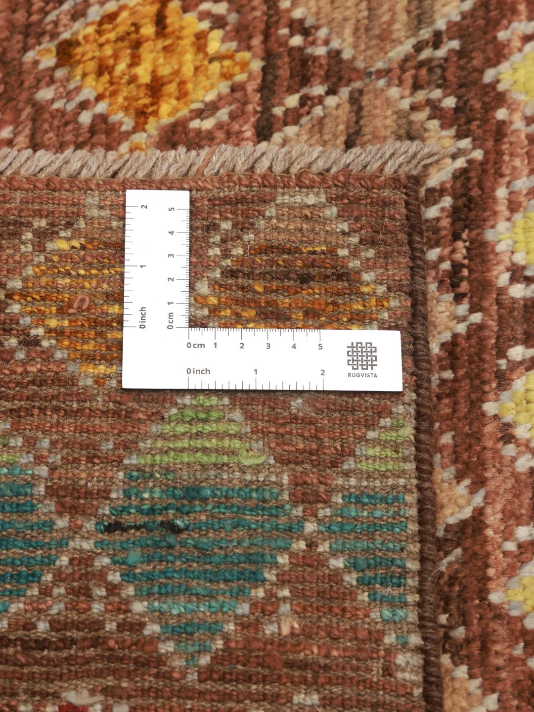Handgeknoopt Berber vloerkleed met een levendig meerkleurig dambordpatroon uit Afghanistan