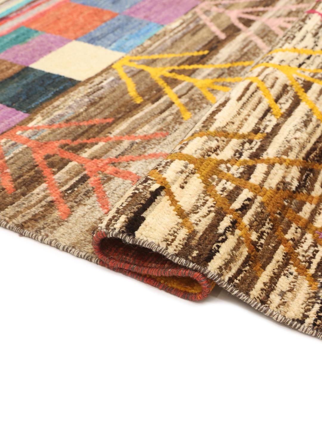 Hand-knotted Afghan runner with a vibrant multicolor geometric and tree-inspired pattern