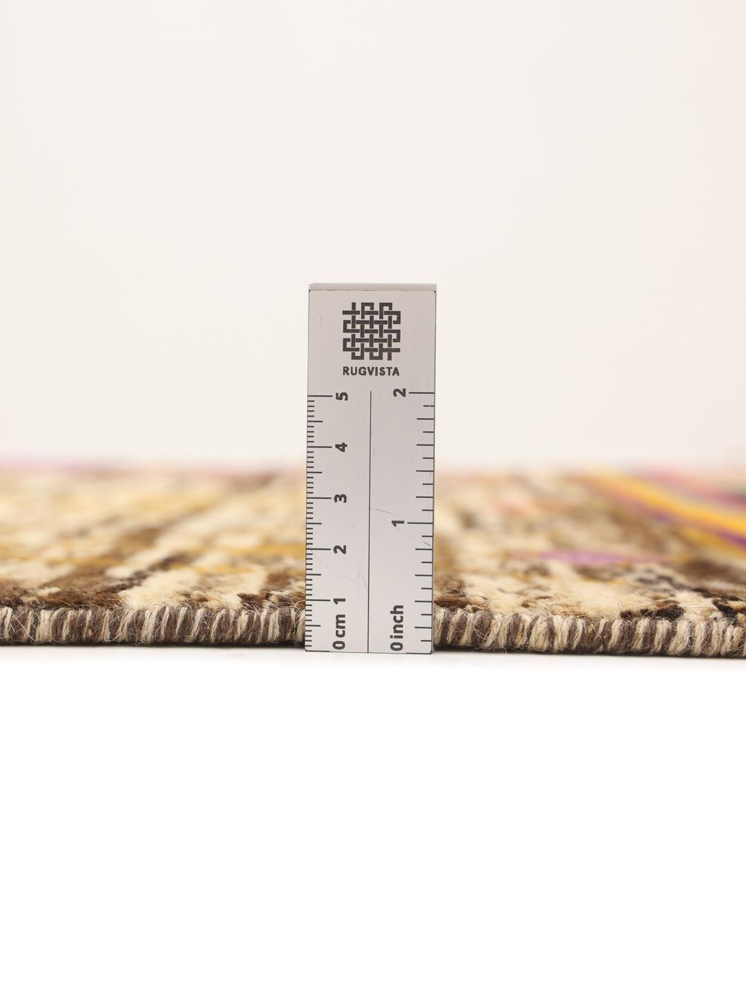 Hand-knotted Afghan runner with a vibrant multicolor geometric and tree-inspired pattern