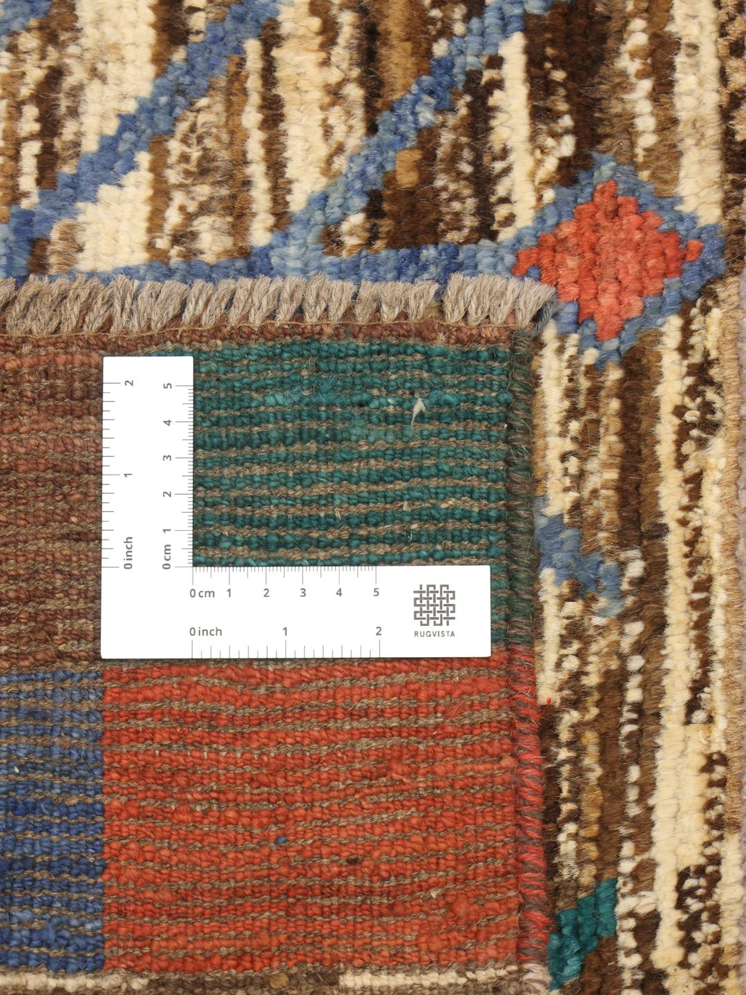 Hand-knotted Afghan runner with a vibrant multicolor geometric and tree-inspired pattern