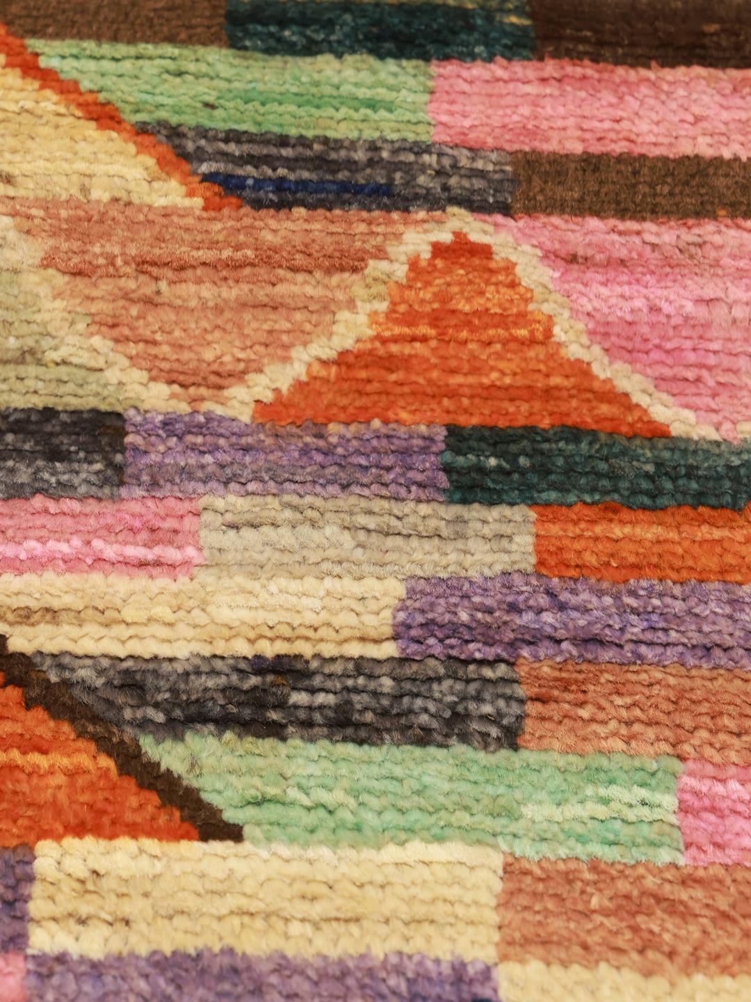 Hand-knotted Middle Eastern rug with a vibrant geometric pattern in multicolor Wool