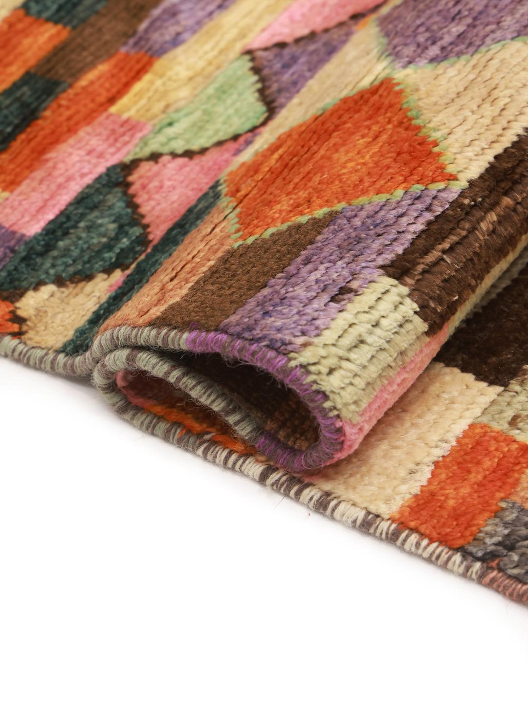 Hand-knotted Middle Eastern rug with a vibrant geometric pattern in multicolor Wool