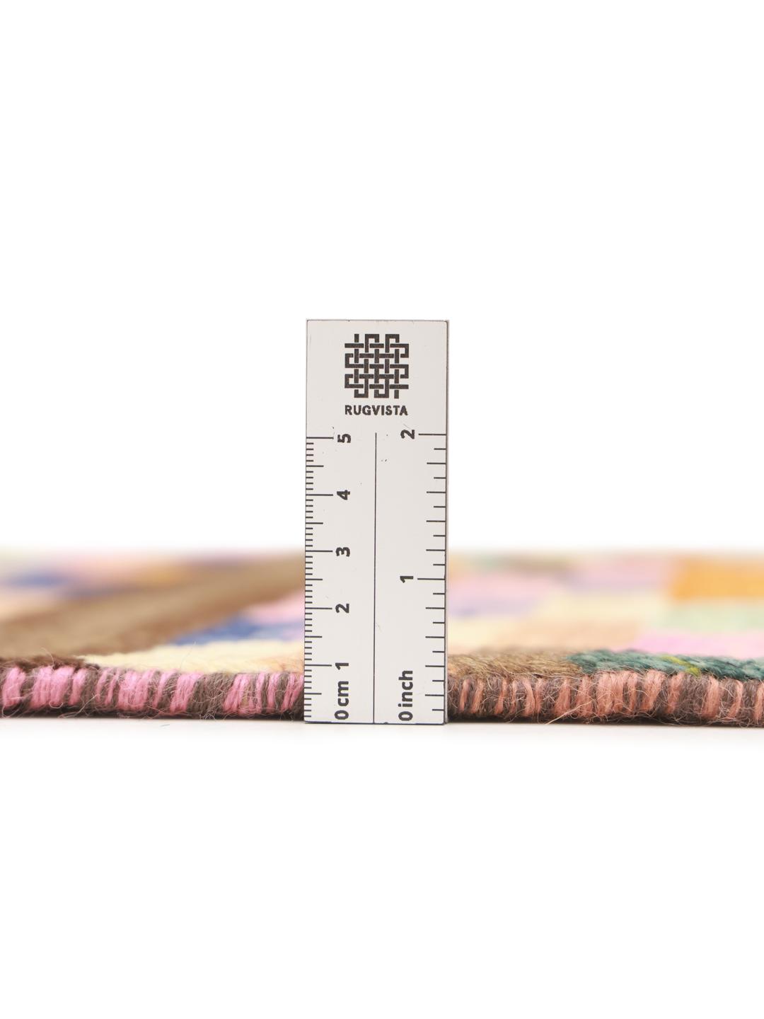 Hand-knotted Middle Eastern rug with a vibrant geometric pattern in multicolor Wool