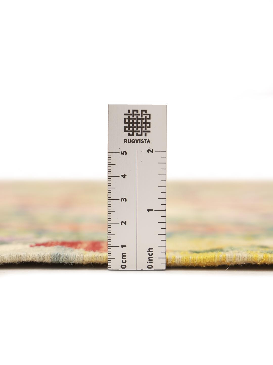 A hand-woven, multicolored Afghan Kelim rug with intricate geometric diamond patterns.