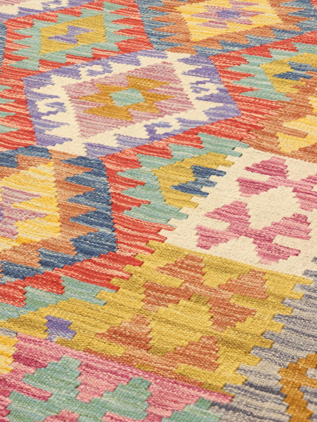 Hand-woven Afghan Kelim rug with geometric patterns in multicolor Wool.