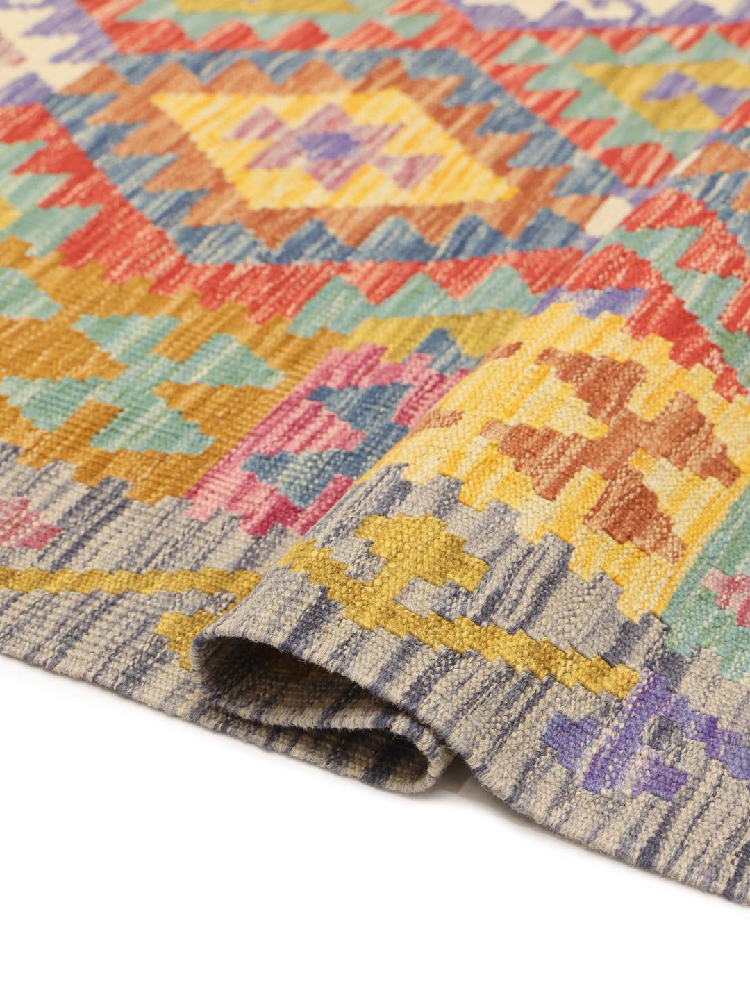 Hand-woven Afghan Kelim rug with geometric patterns in multicolor Wool.