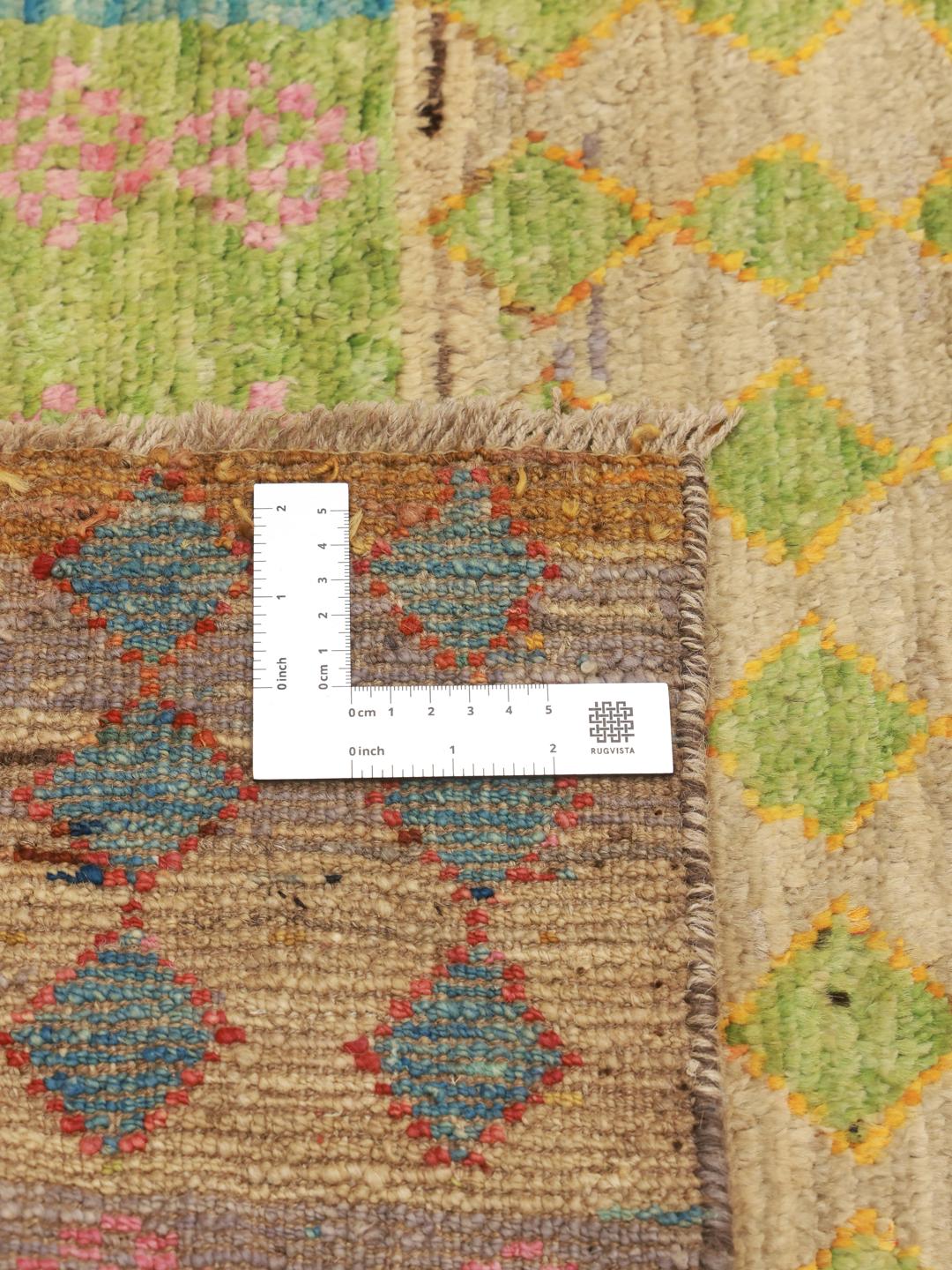 Hand-knotted Afghan rug with a colourful geometric patchwork design in multicolour Wool.