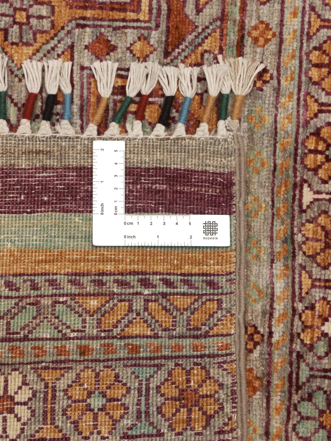 Tapis afghan noué à la main avec des motifs géométriques multicolores