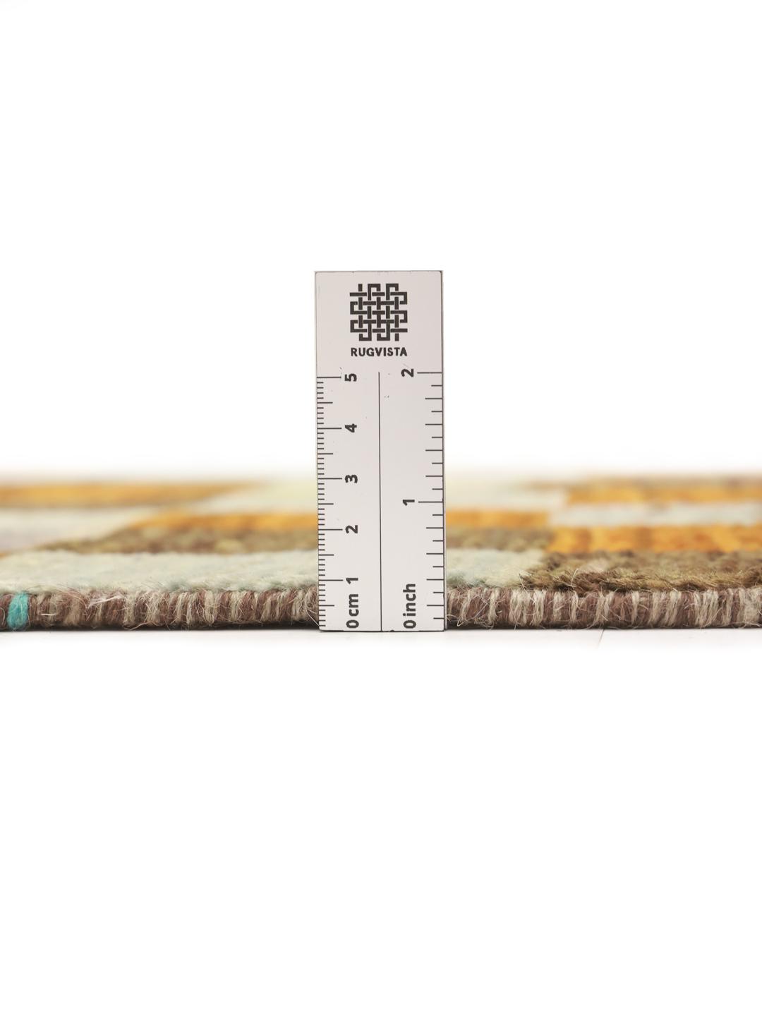 A vibrant, checkered hand-knotted wool runner rug from the Middle East in multicolor tones.