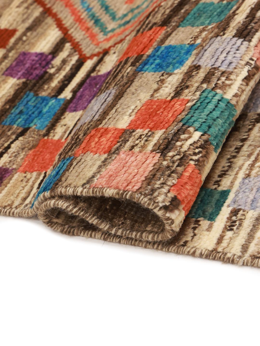 Hand-knotted Afghan rug featuring a colourful geometric mosaic pattern in multicolour wool.