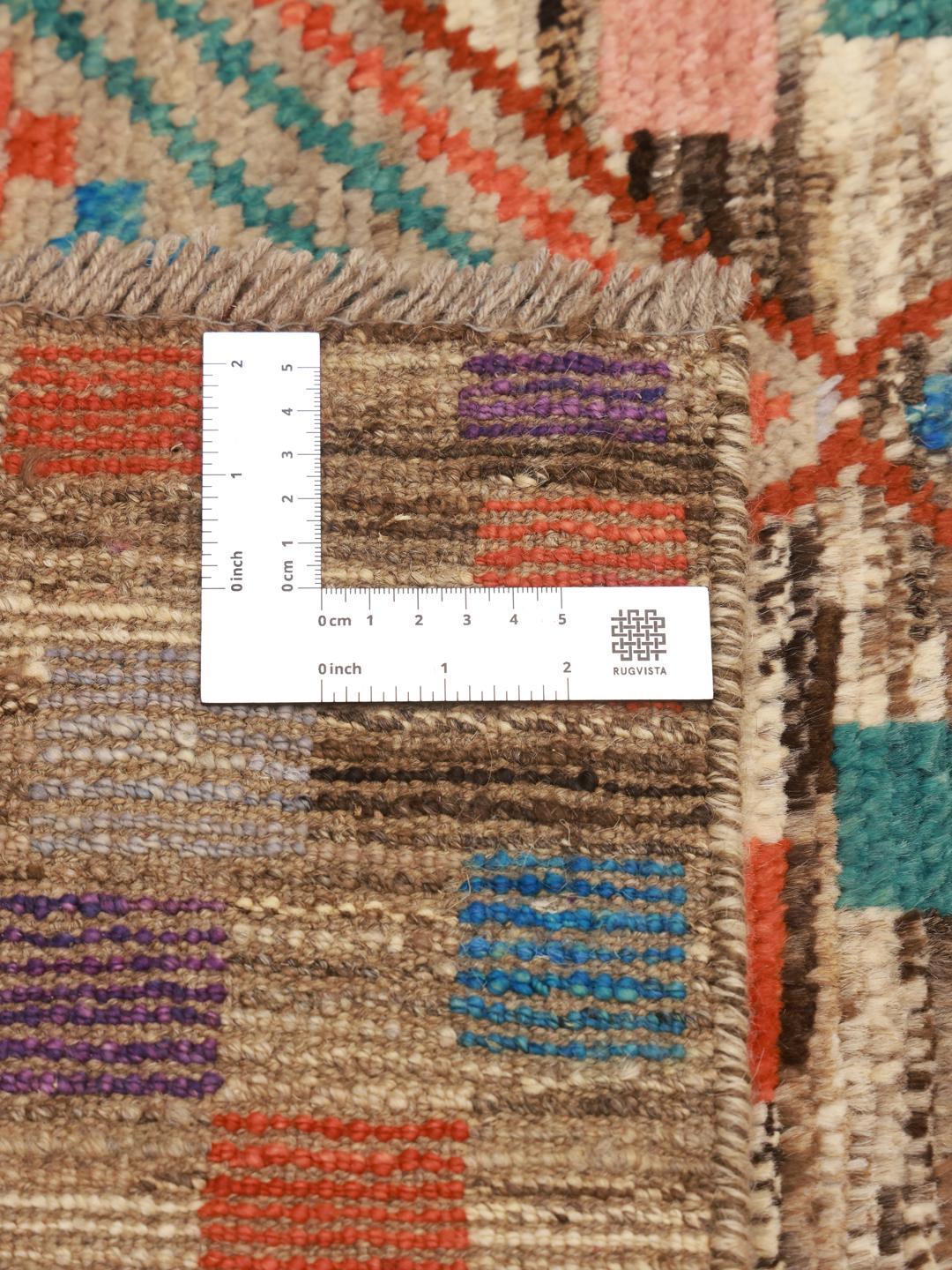Hand-knotted Afghan rug featuring a colourful geometric mosaic pattern in multicolour wool.
