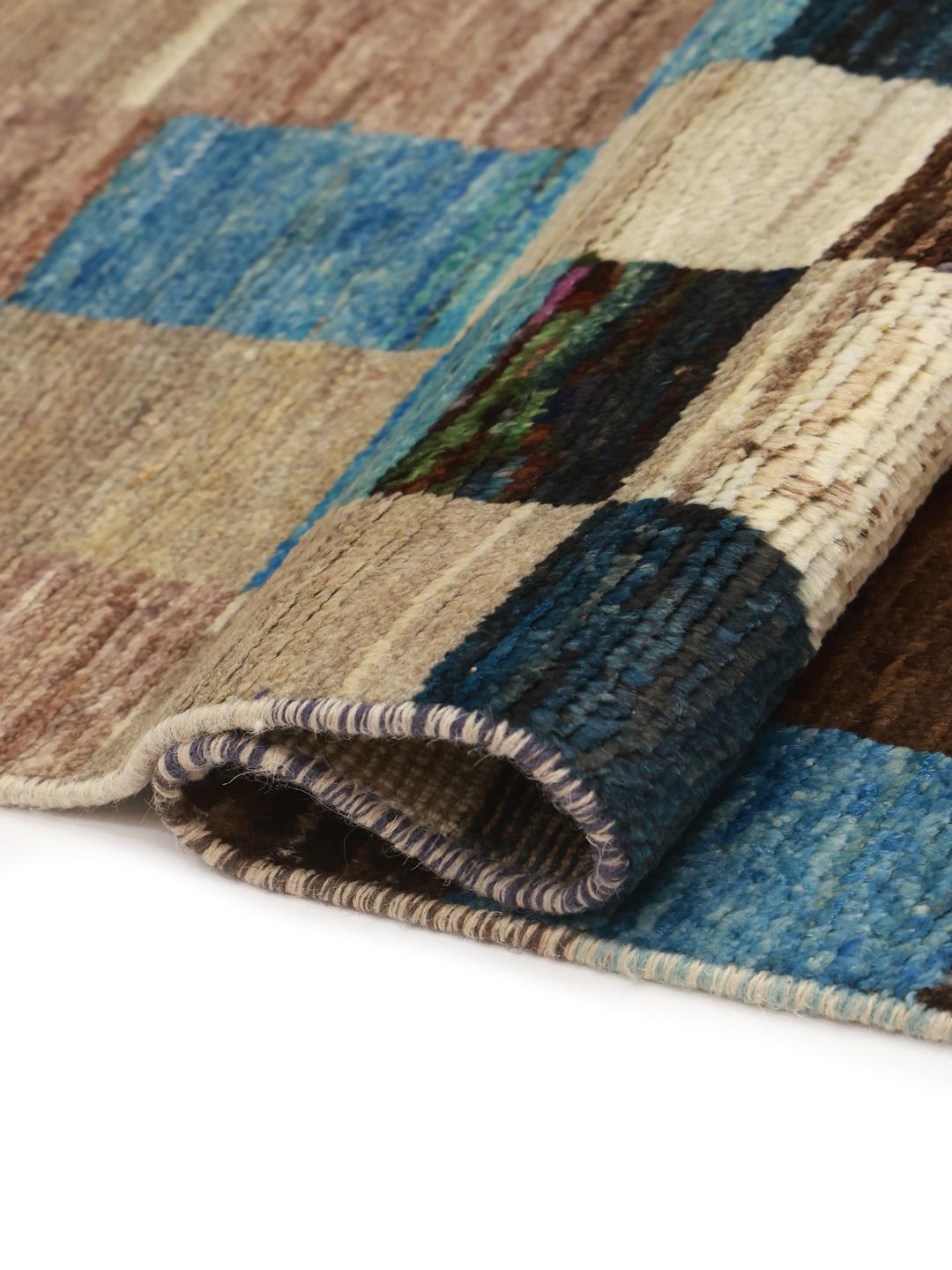 Hand-knotted multicolored Afghan runner with a vibrant patchwork pattern