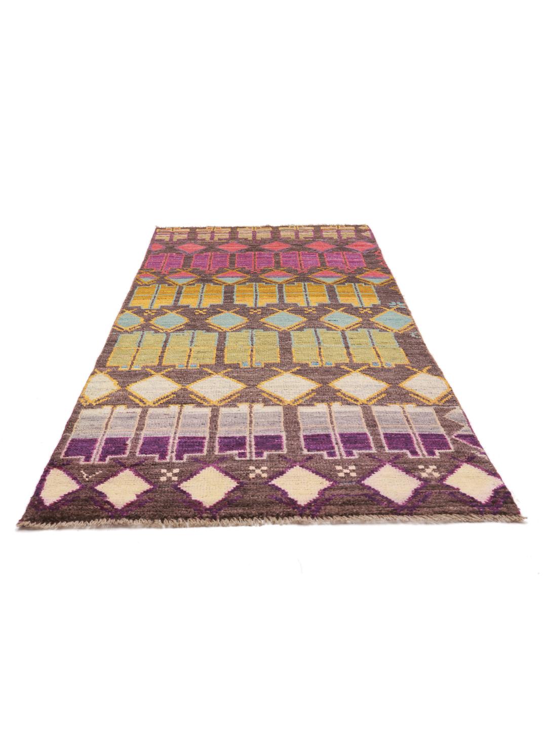 Hand-knotted Afghan runner rug with a multicolor geometric pattern on a dark background