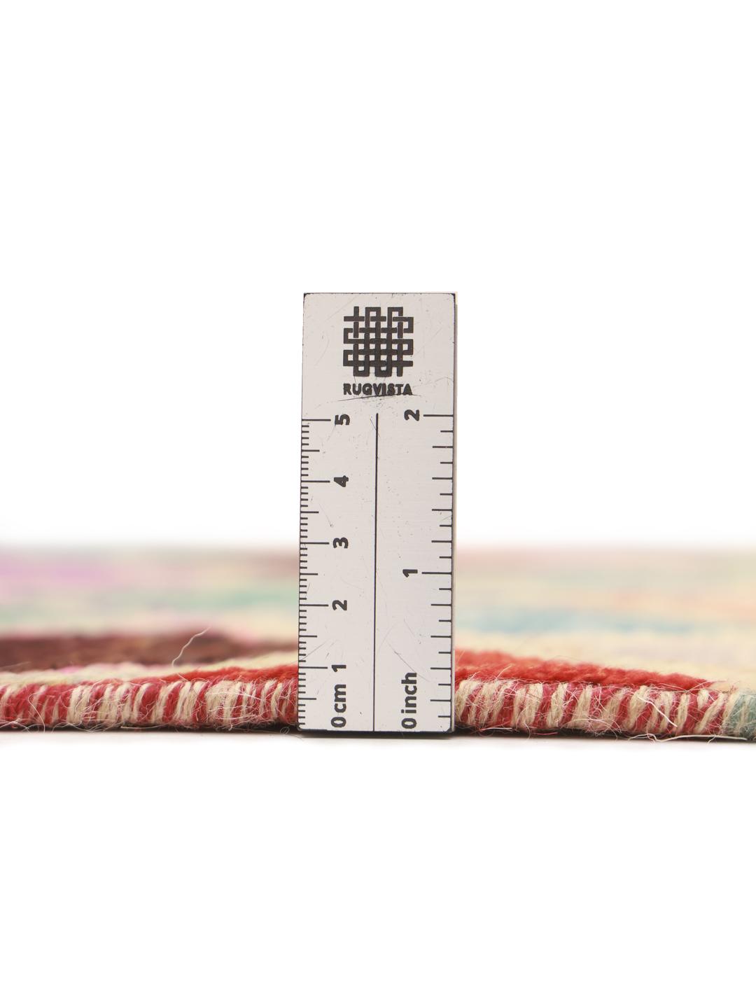Hand-knotted Middle Eastern runner with a vibrant multicolor diamond pattern