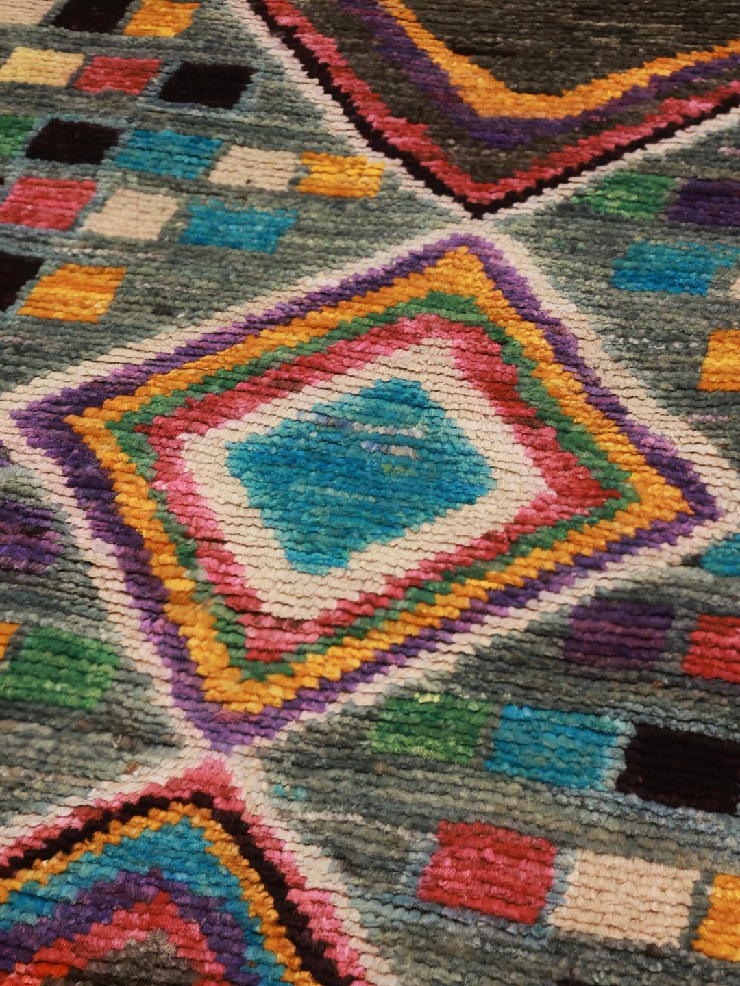 Hand-knotted Afghan runner with a colourful mosaic pattern and geometric diamonds
