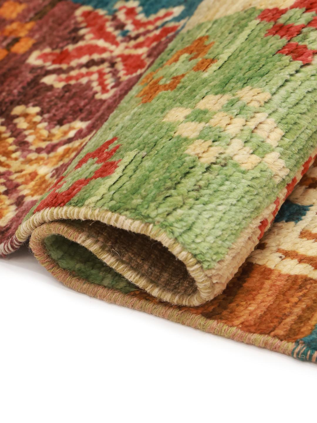 Hand-knotted Afghan runner with a vibrant, multicolor patchwork design