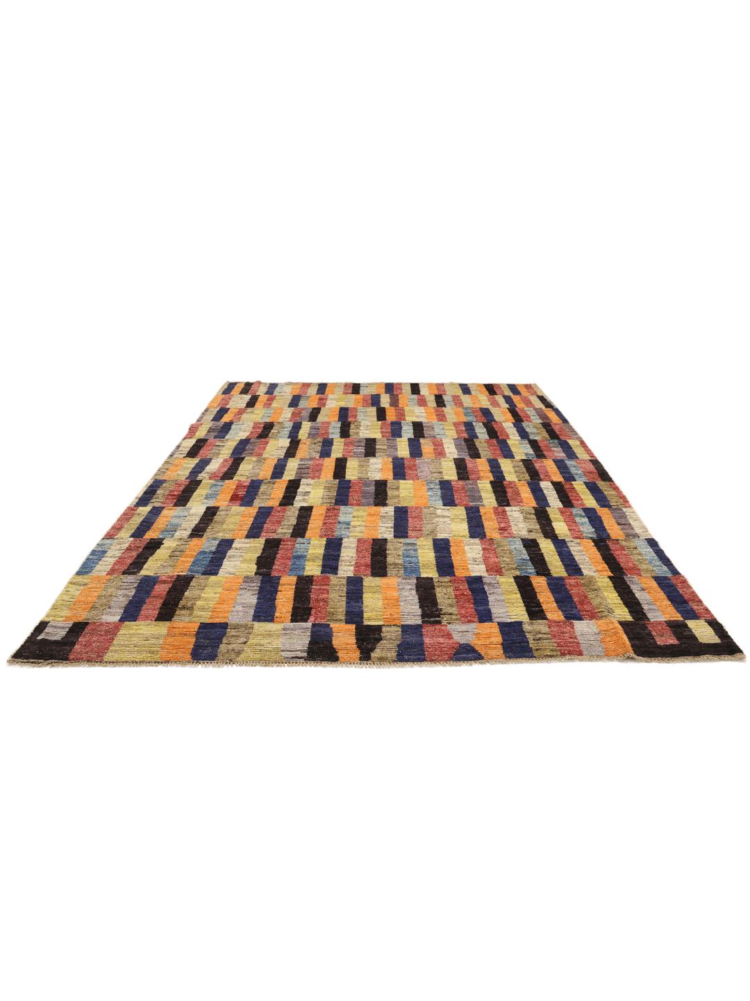 A vibrant, multi-coloured hand-knotted rug from Afghanistan with a block pattern.