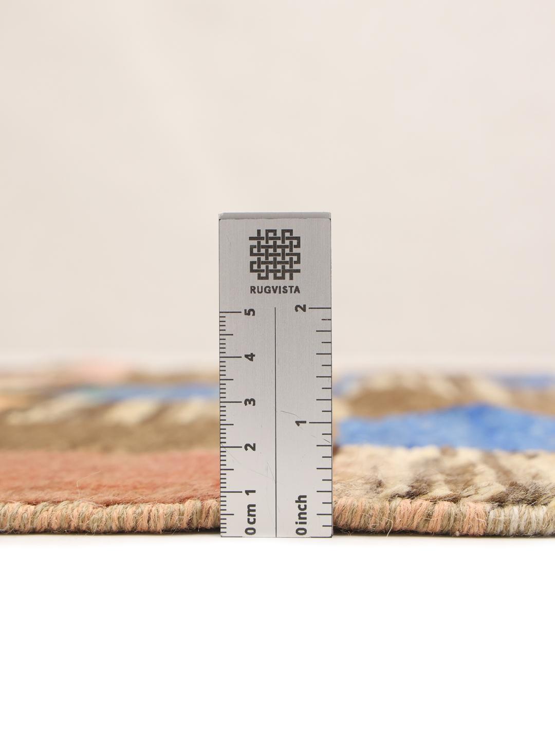 Håndknyttet løber med et farverigt geometrisk patchwork-mønster fra Afghanistan