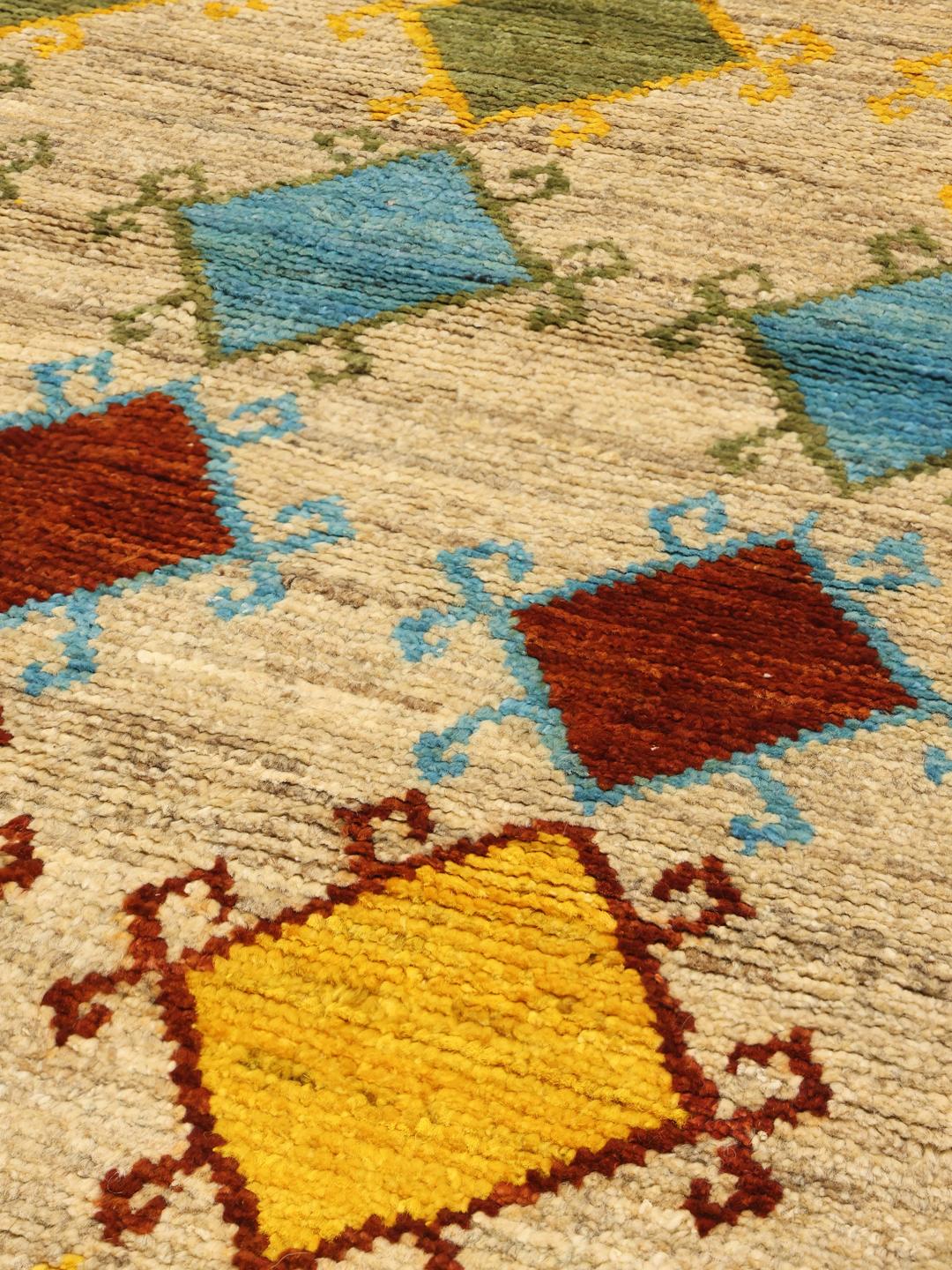 Hand-knotted Afghan runner with vibrant diamond patterns in multicolour wool