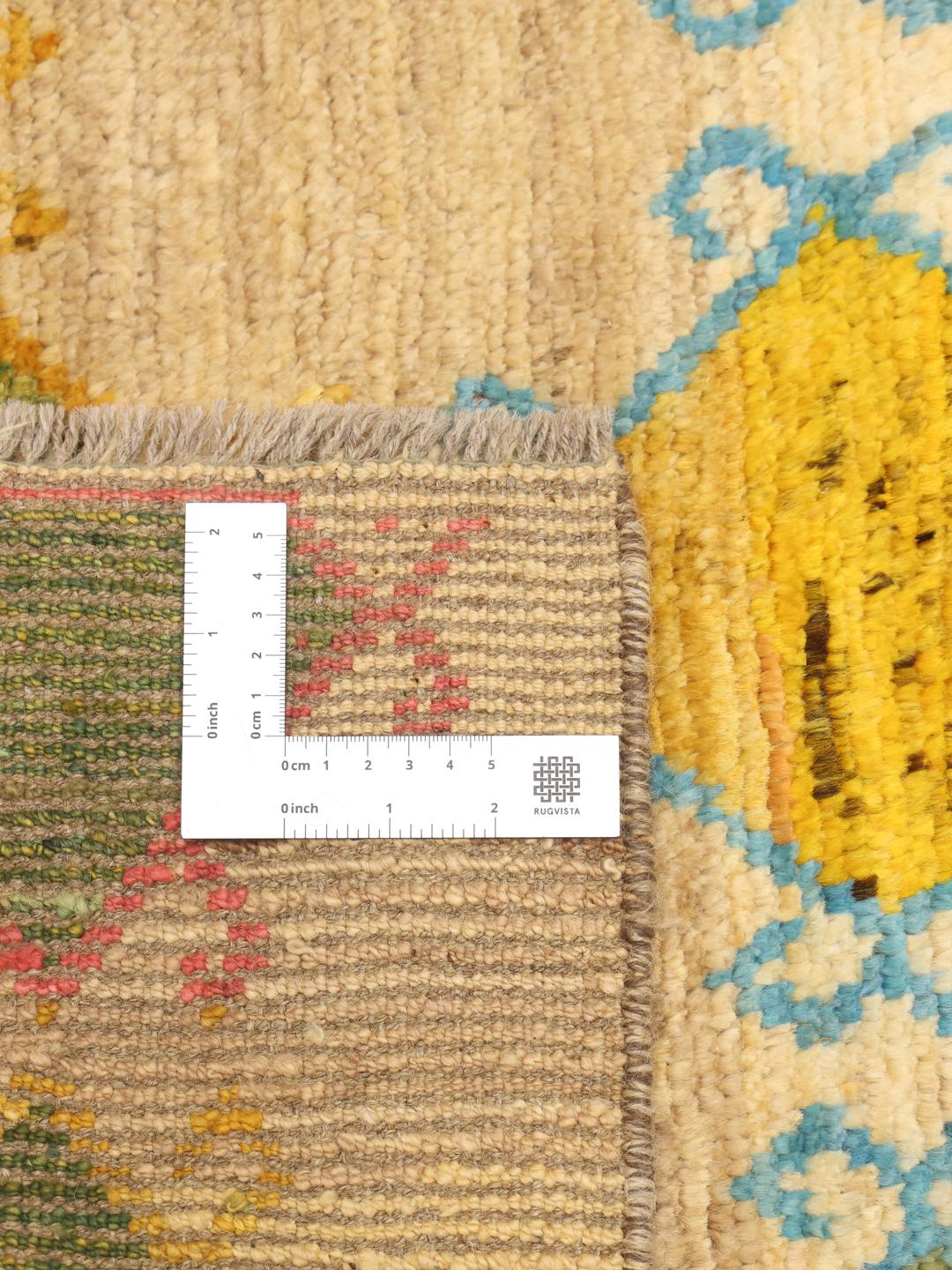 Hand-knotted Afghan runner with vibrant diamond patterns in multicolour wool
