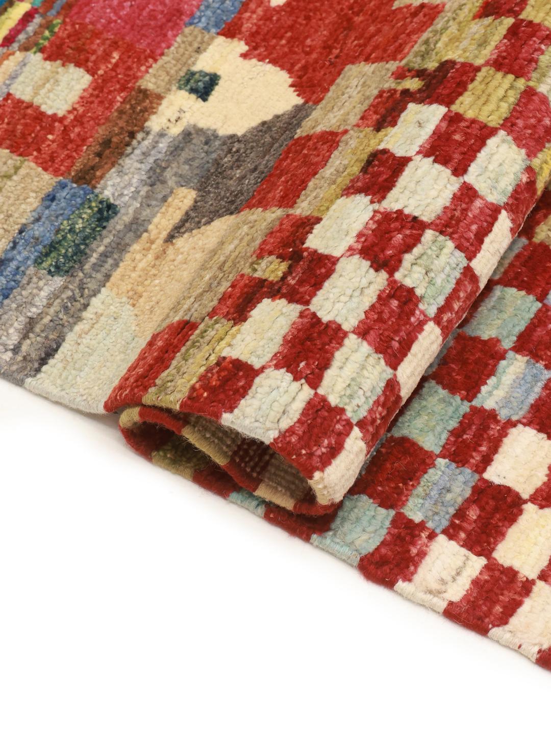Hand-knotted Afghan rug with a colourful geometric pattern
