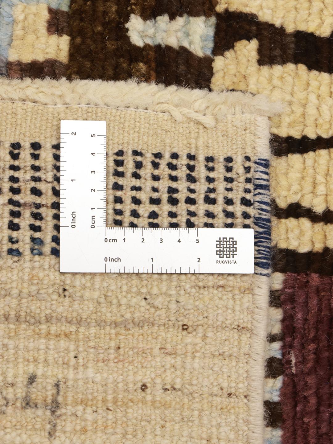 Hand-knotted Afghan rug with a colourful geometric pattern