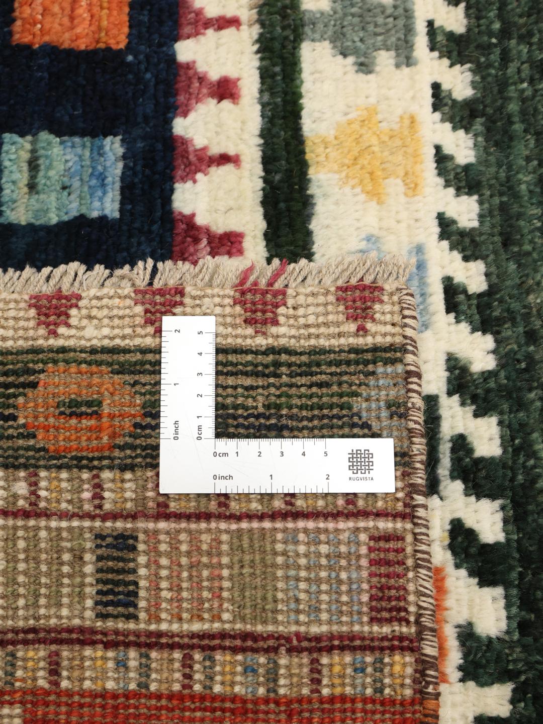 A hand-knotted Afghan Berber rug with a vibrant, multicolor geometric design.