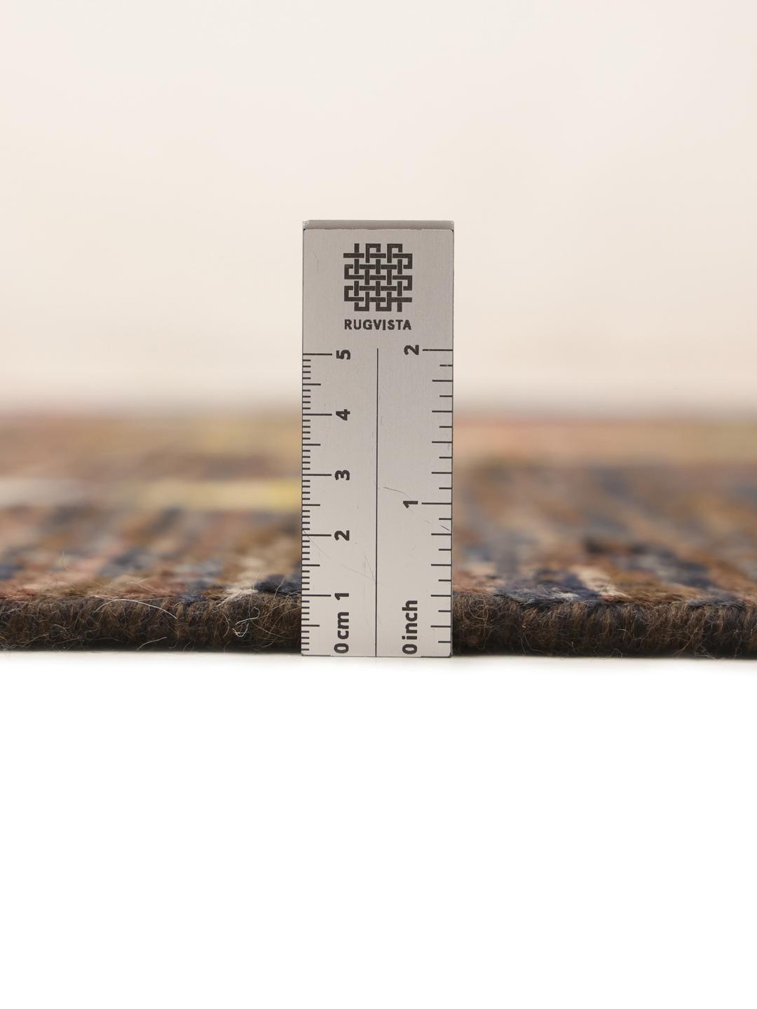 Hand-knotted Afghan Berber Colourful rug with a dark field and multicoloured geometric diamonds.