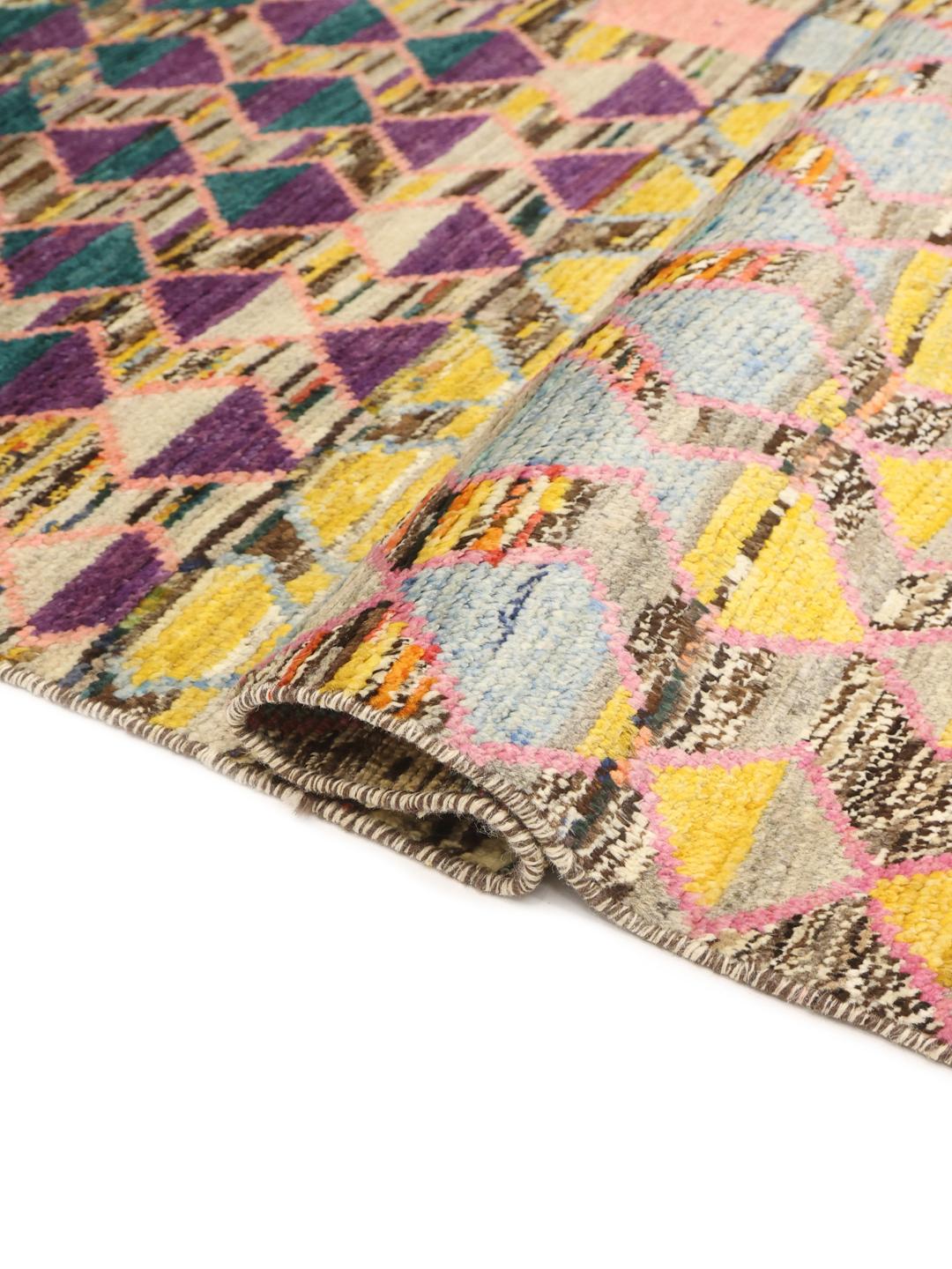 Hand-knotted Afghan rug with vibrant diamond patterns and multicolor design