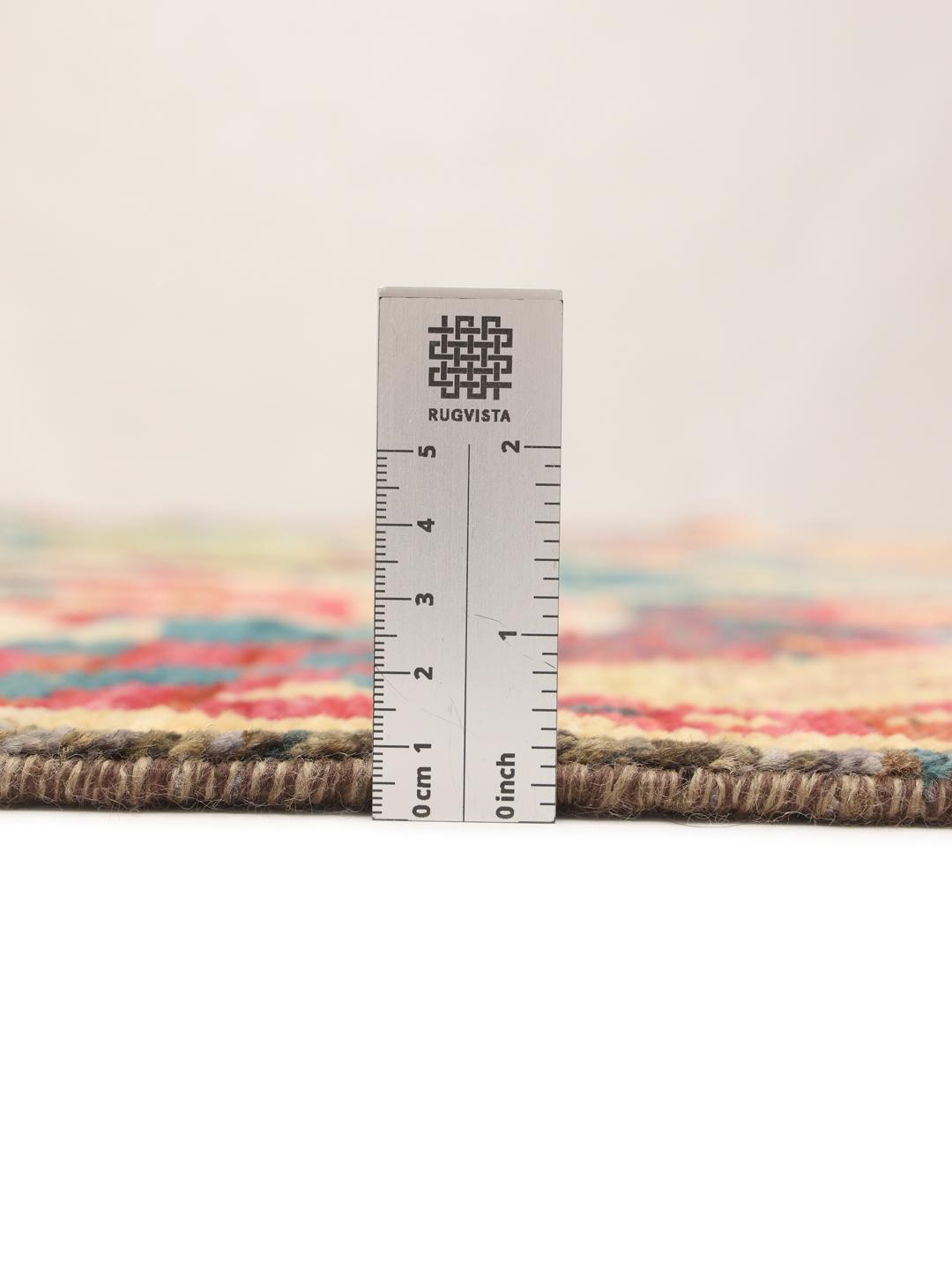 Hand-knotted Afghan rug with vibrant abstract patterns in multicolor