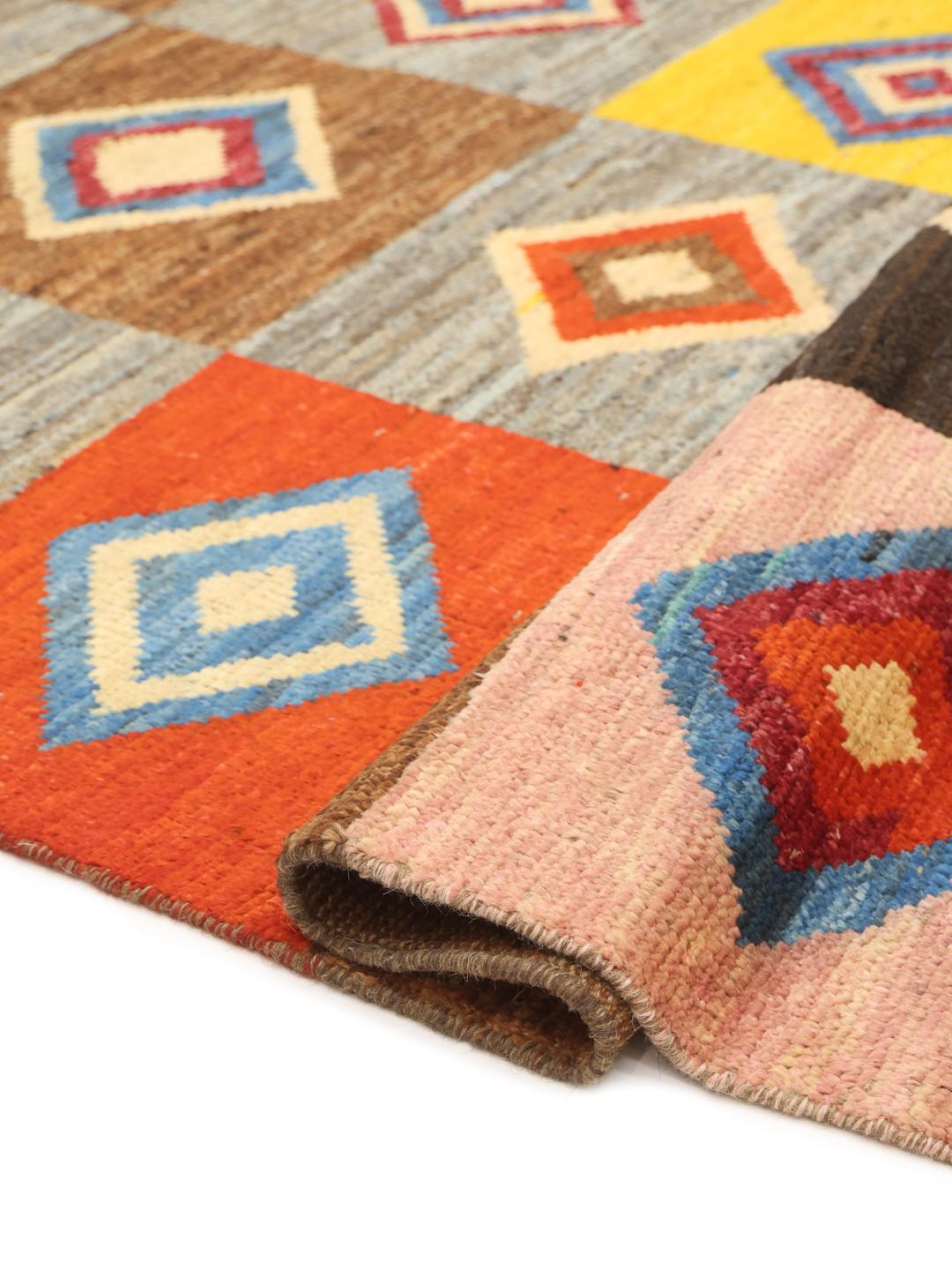 Hand-knotted colourful geometric Wool rug from the Middle East