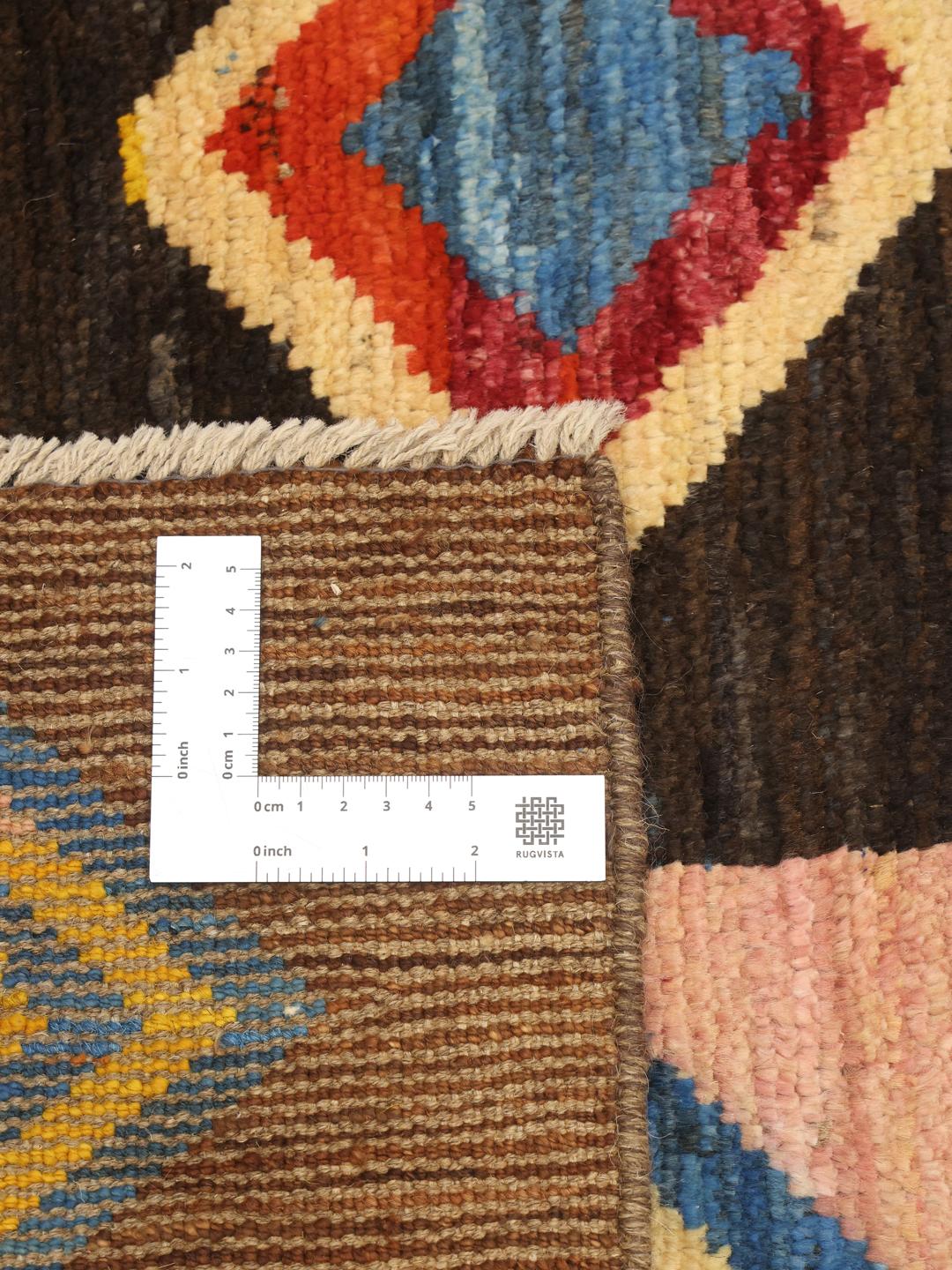 Hand-knotted colourful geometric Wool rug from the Middle East