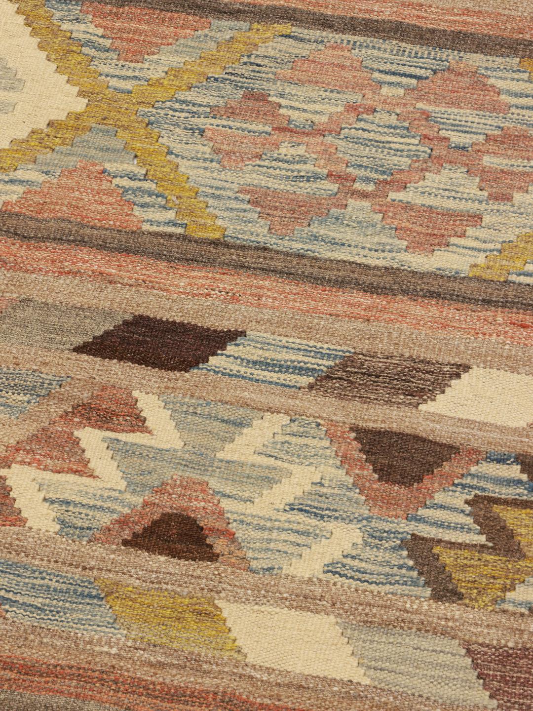 Hand-woven Afghan Kilim Ariana rug in multicolor geometric patterns