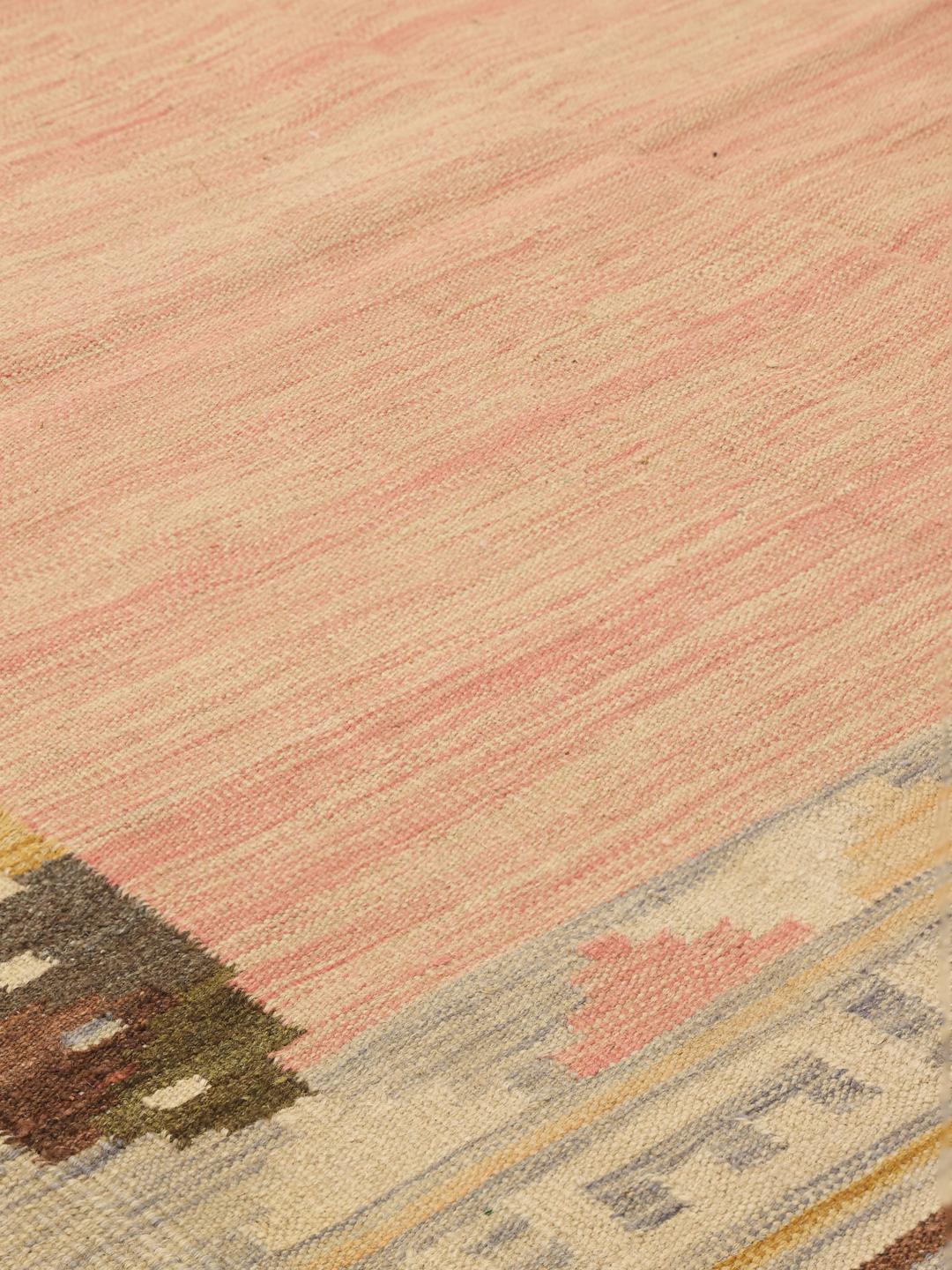 Hand-woven Afghan flatweave rug in pink