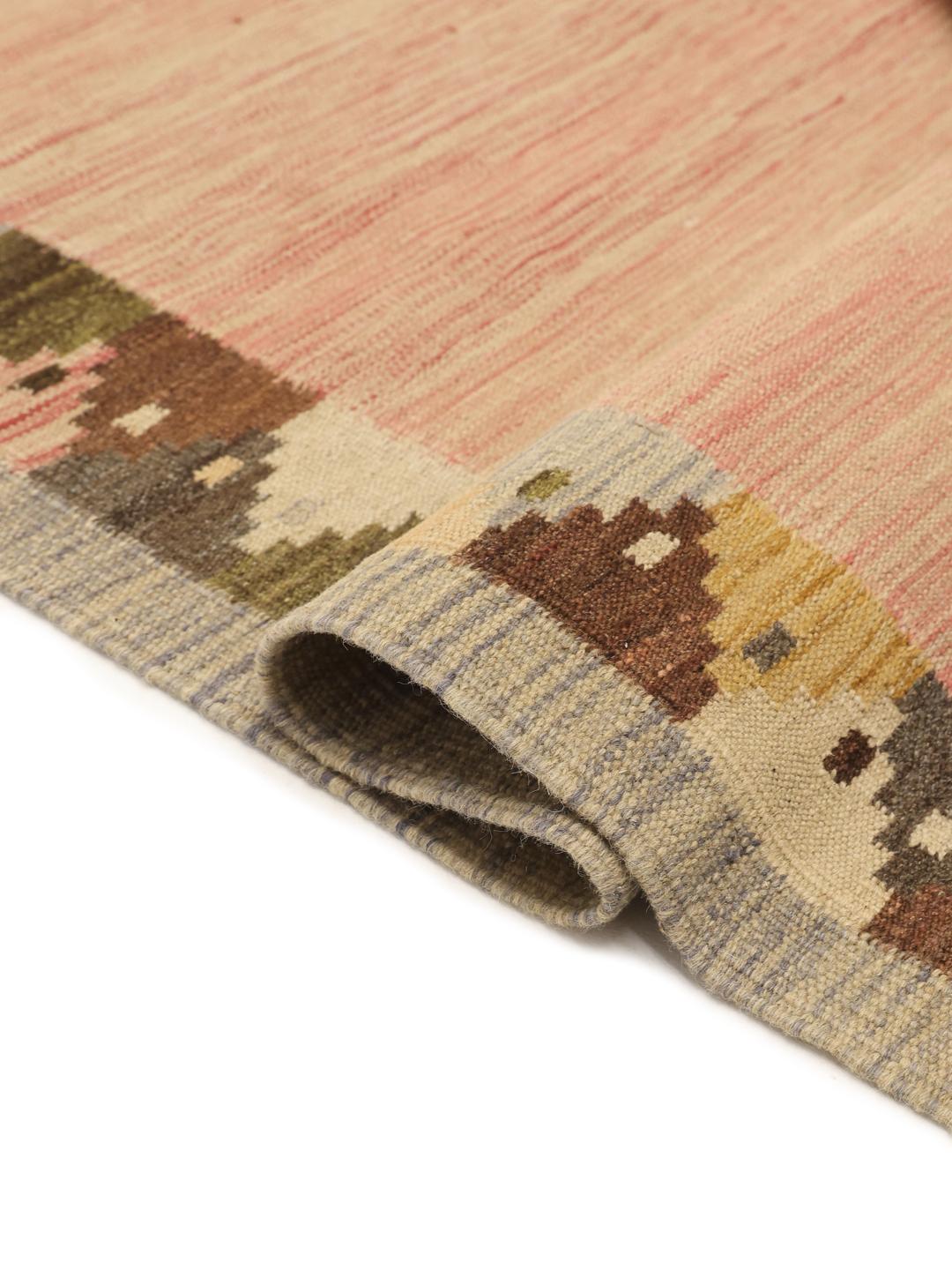 Hand-woven Afghan flatweave rug in pink