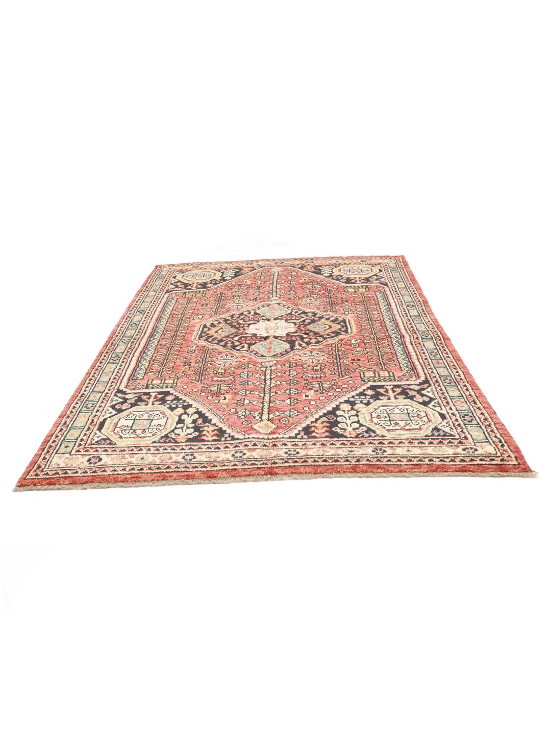 Hand-knotted Kazak rug from Afghanistan in deep red and black tones