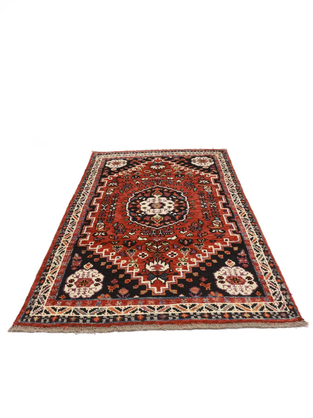 Hand-knotted Kazak rug from Afghanistan in red and black