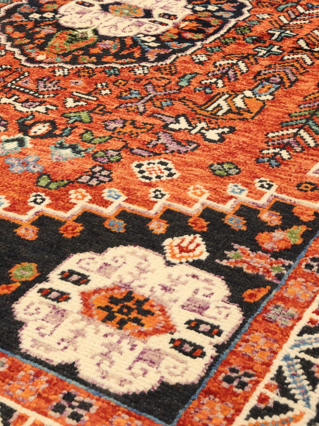 Hand-knotted Kazak rug from Afghanistan with vibrant multicolor geometric patterns
