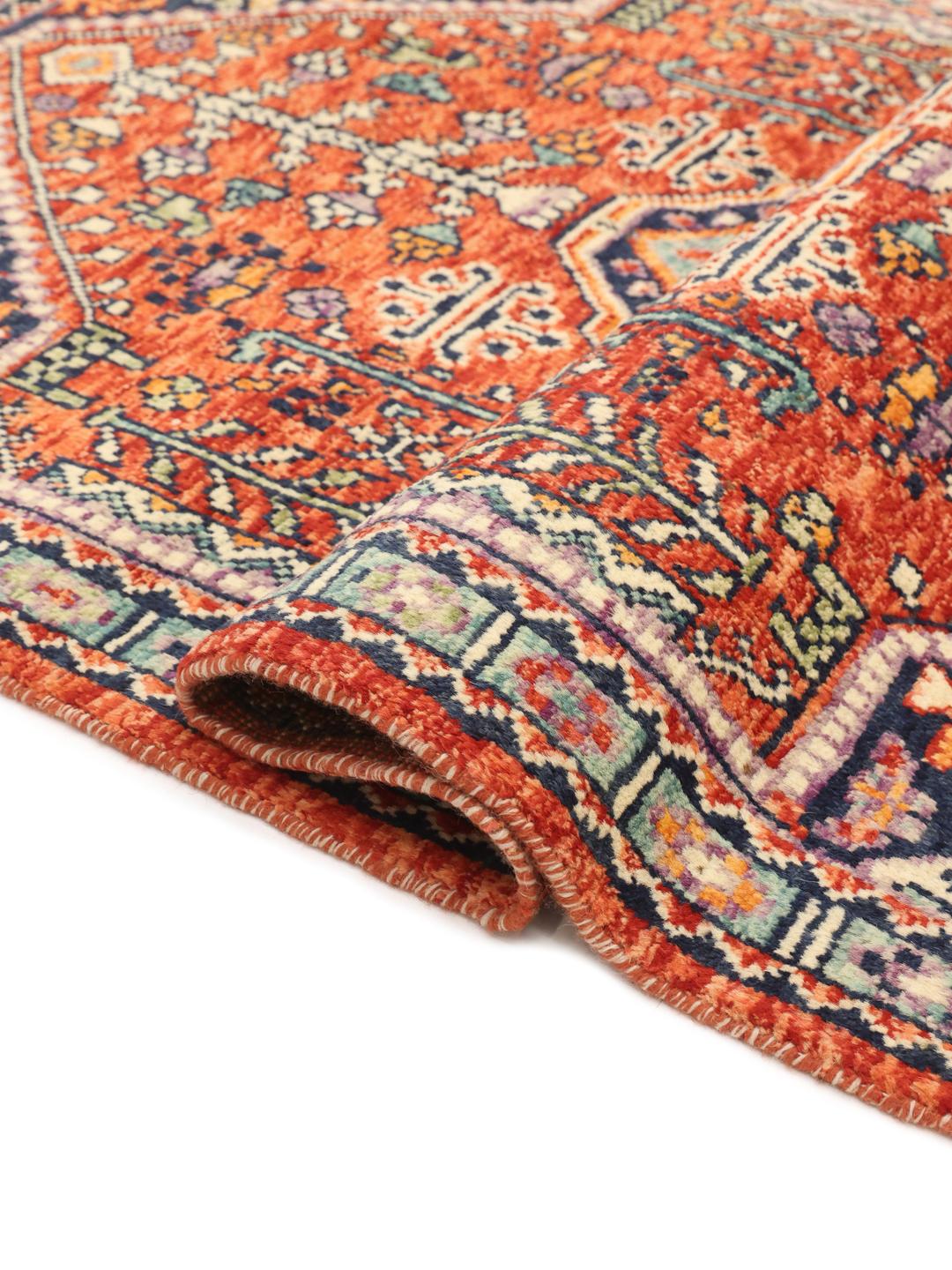 Hand-knotted Afghan Kazak rug with red and blue geometric patterns