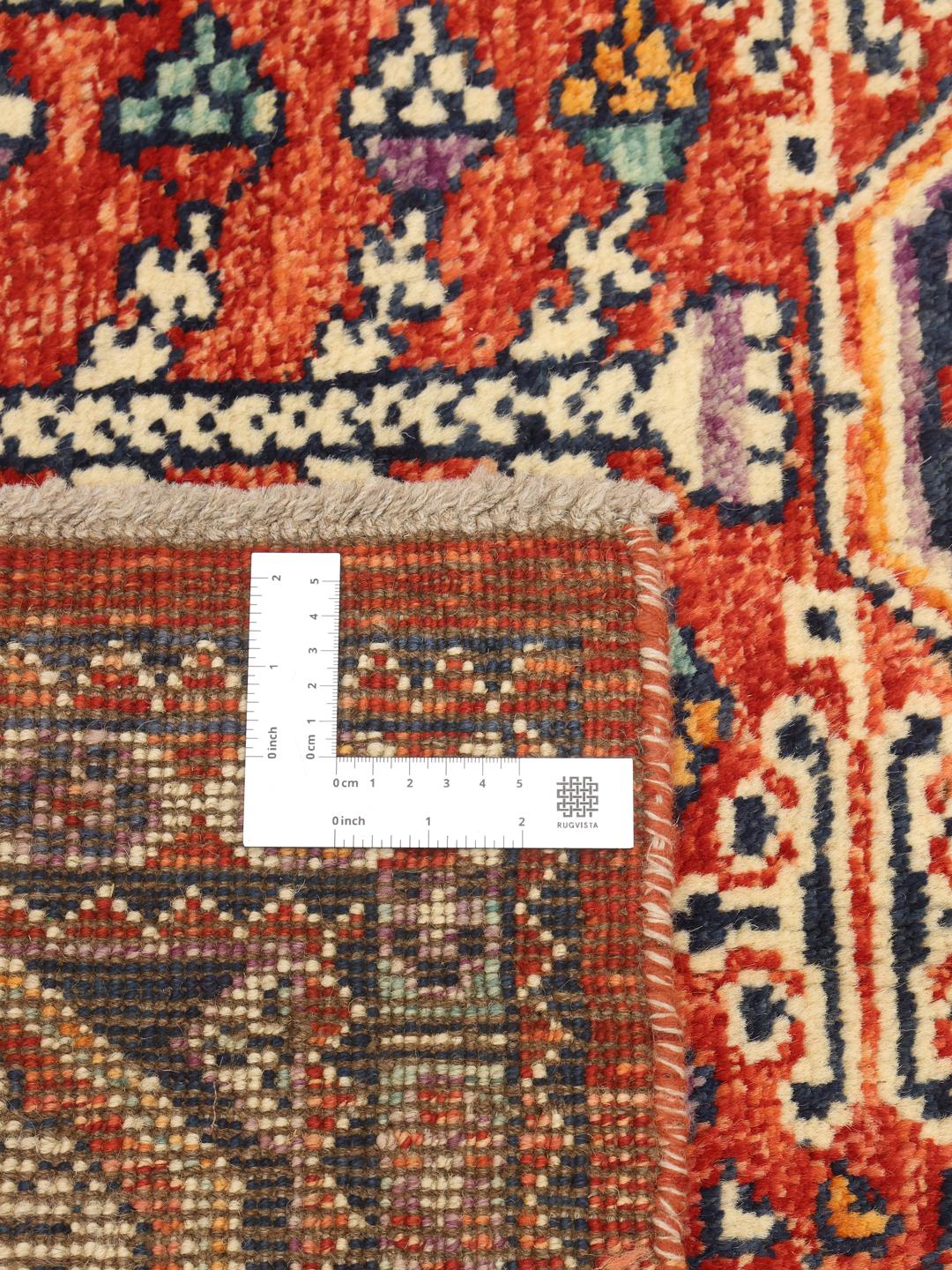 Hand-knotted Afghan Kazak rug with red and blue geometric patterns