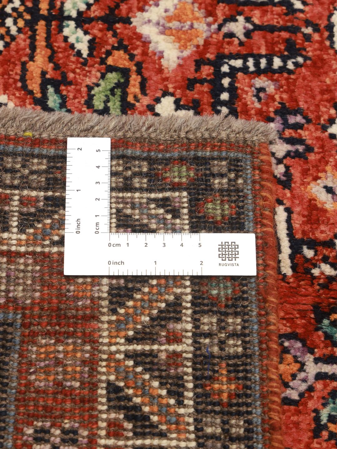 Hand-knotted Afghan Kazak rug in red and multicolour tones