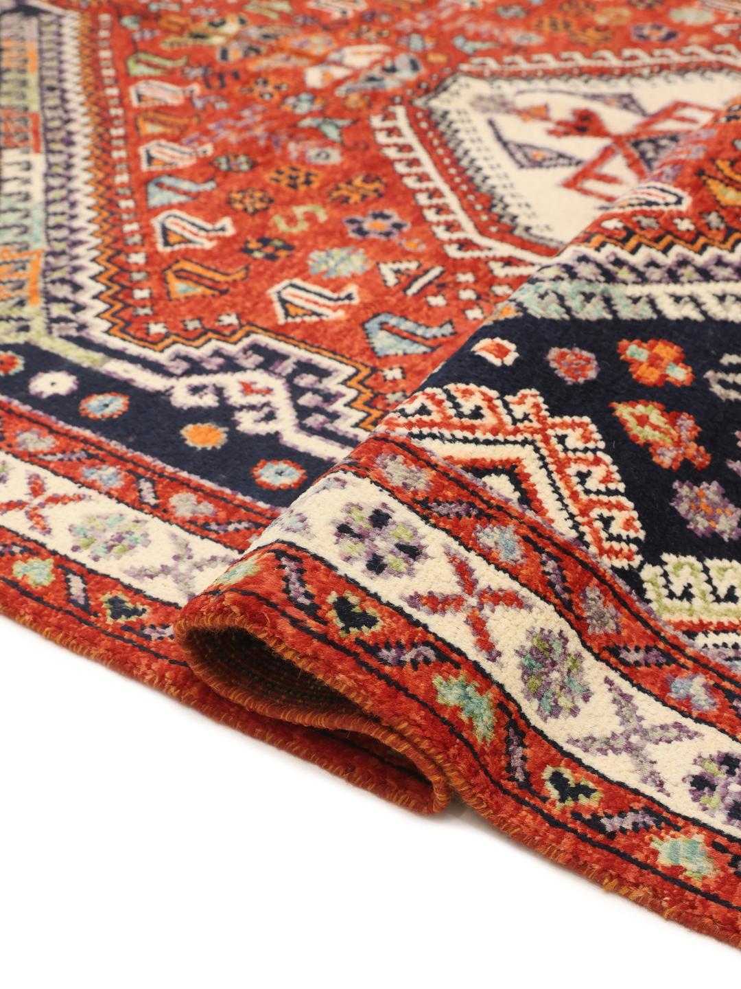 Kazak Teppich aus Afghanistan in Dunkelblau und Rottönen