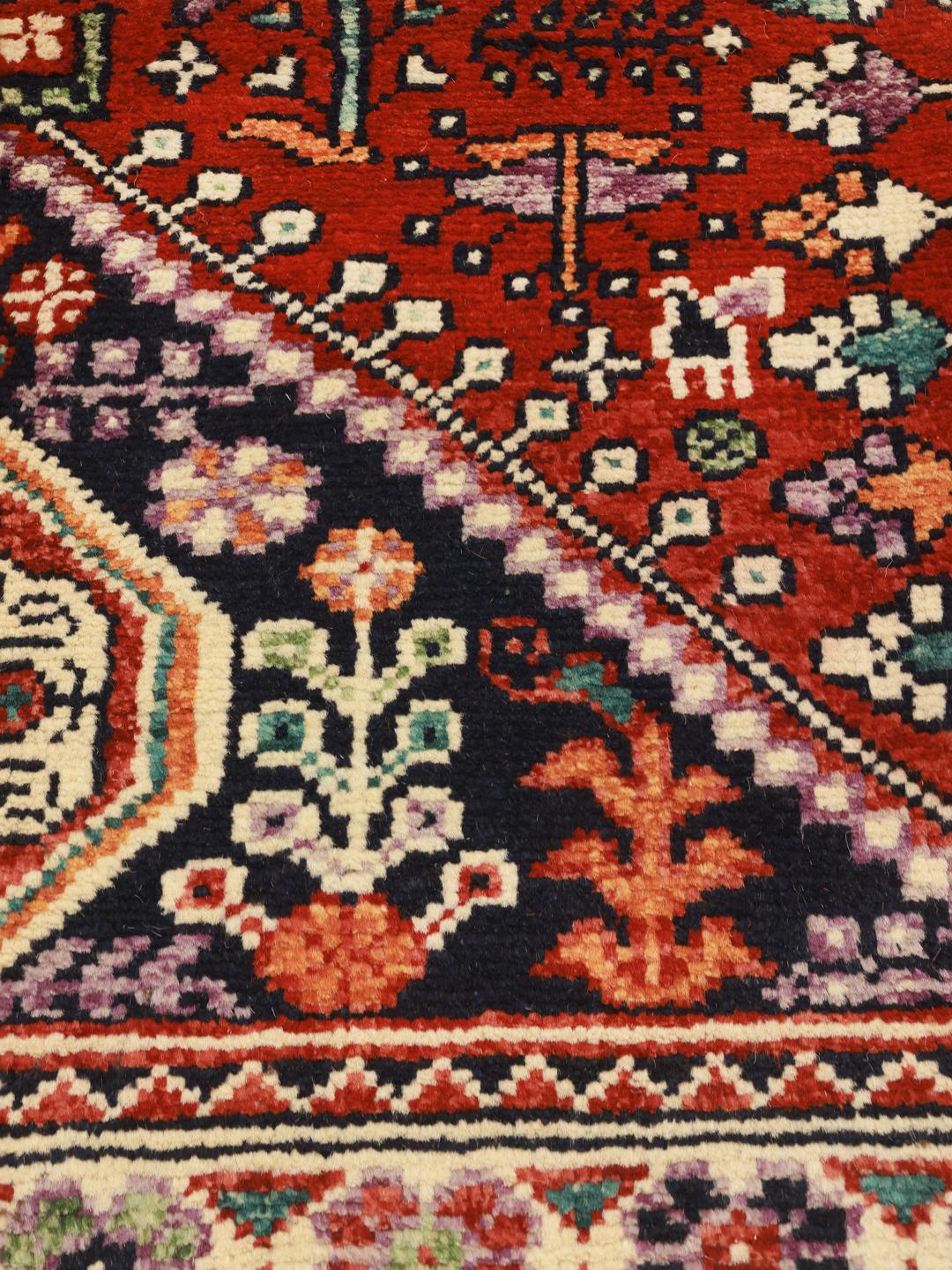 Hand-knotted Kazak rug from Afghanistan in red and blue