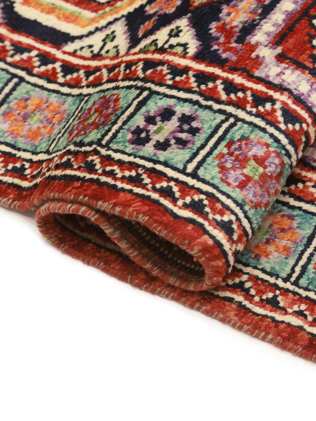 Hand-knotted Kazak rug from Afghanistan in red and blue