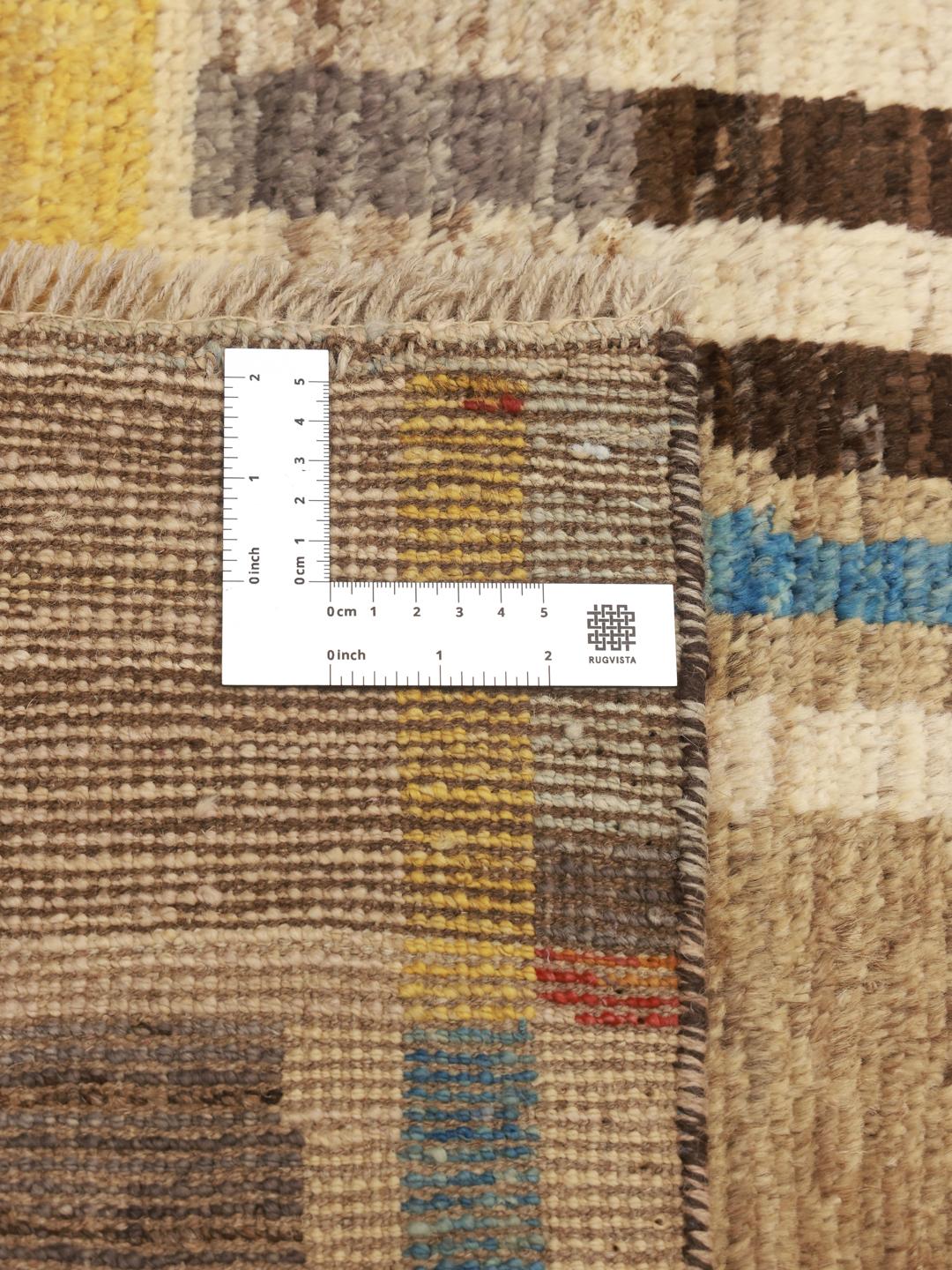 Tapis long afghan noué à la main avec un motif géométrique multicolore vibrant