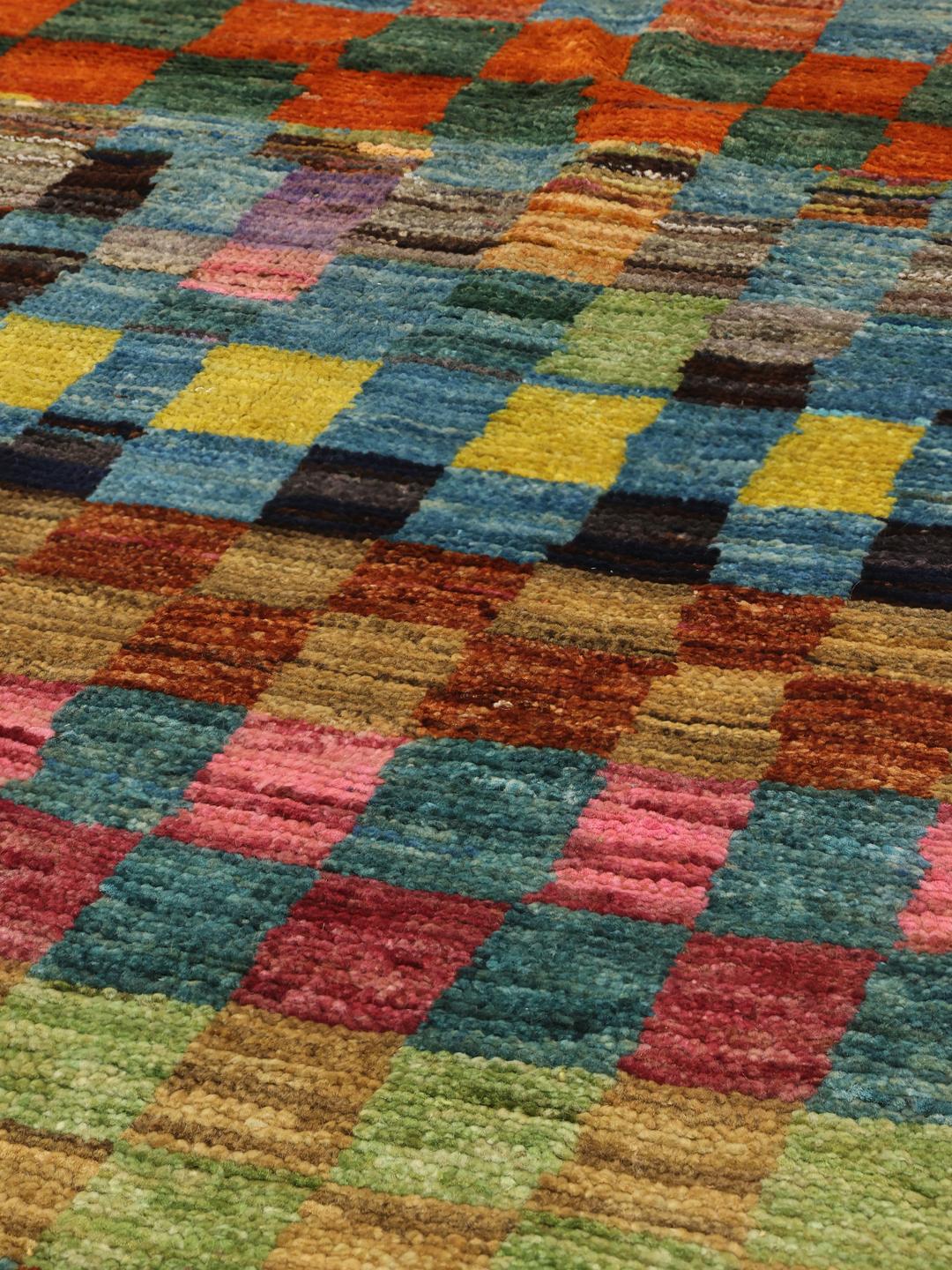 Hand-knotted Afghan runner with a vibrant multicolor checkered pattern