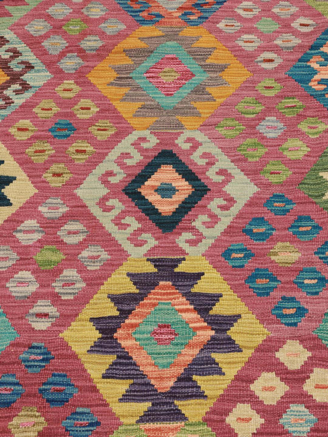 Hand-woven Afghan Kelim rug featuring a vibrant multicolor geometric diamond pattern